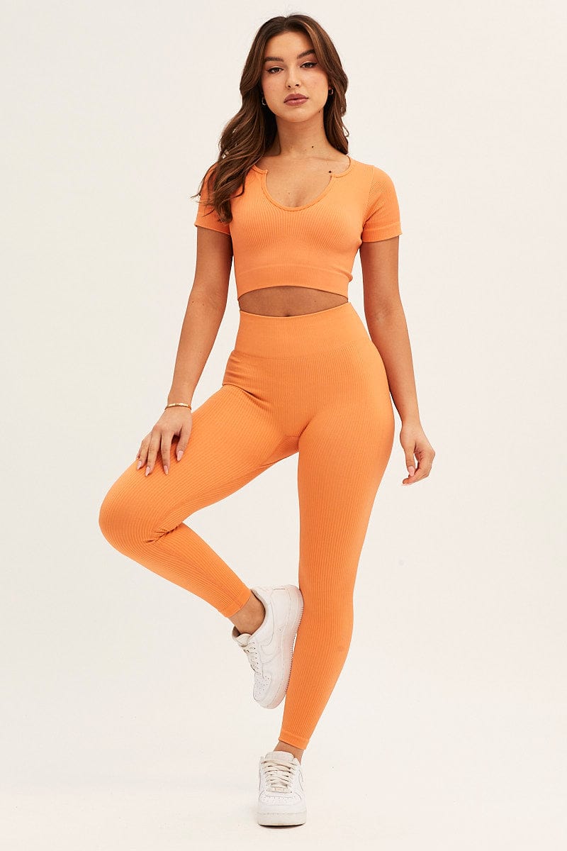 Free People Leggings High Rise Happiness Runs Crop Sparked Orange XS Small