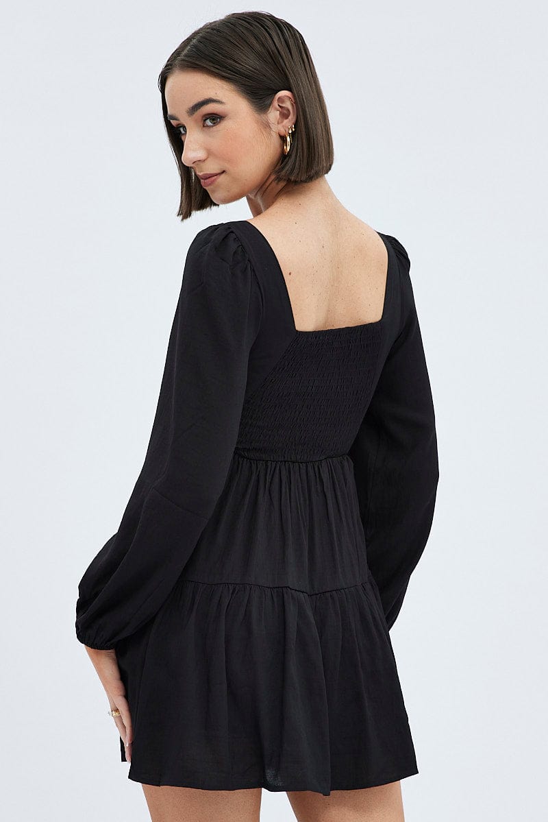 Black fit and outlet flare dress with sleeves