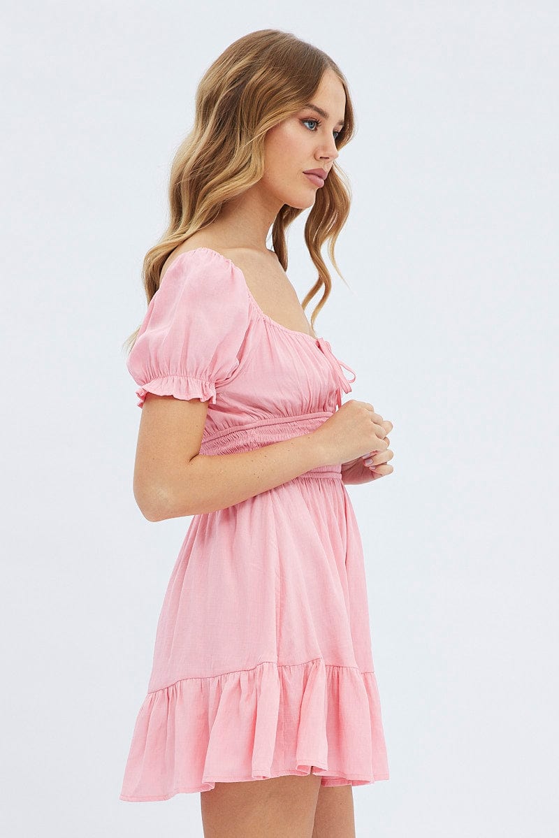 Light pink fit and store flare dress with sleeves