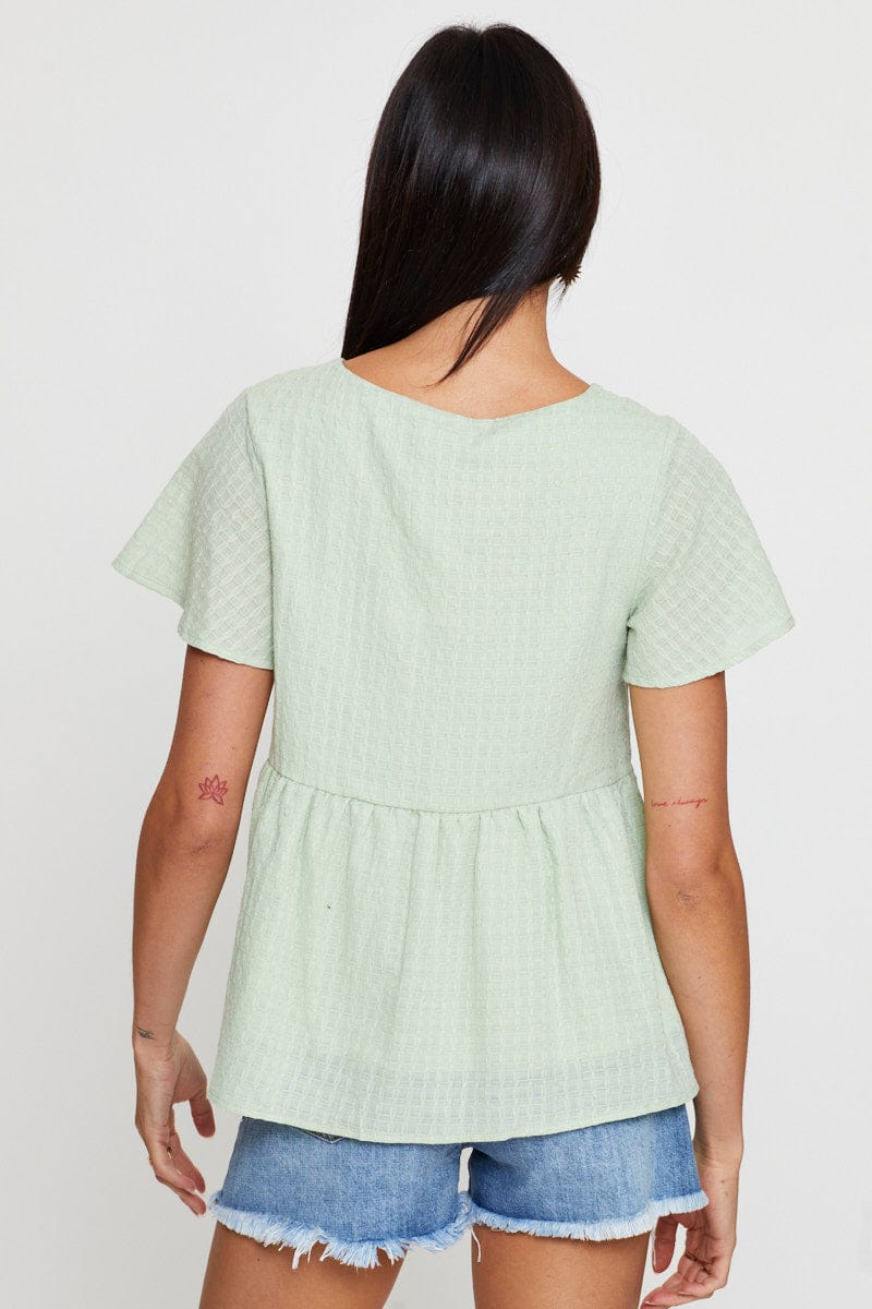 KAFTAN Green Peplum Top Short Sleeve V-Neck Button Front for Women by Ally