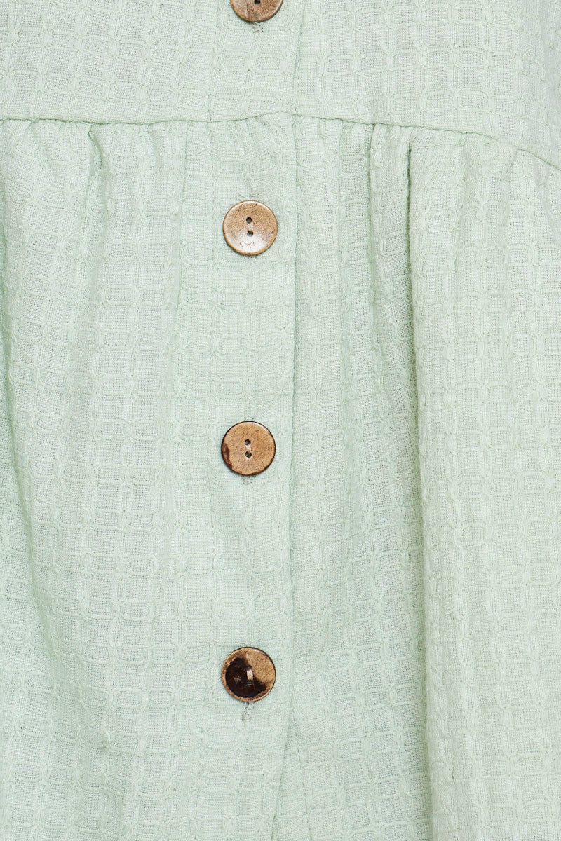 KAFTAN Green Peplum Top Short Sleeve V-Neck Button Front for Women by Ally