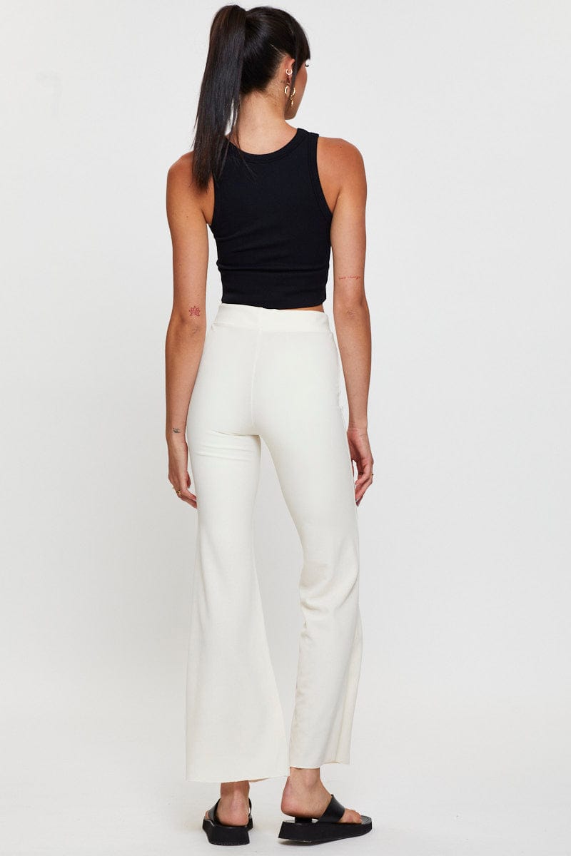 Vibrant White High Rise Crossover Waist Flare Jeans | Lime Lush