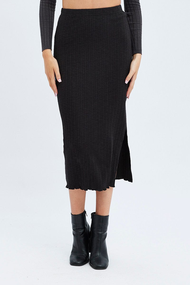 Long black skirt with slits best sale