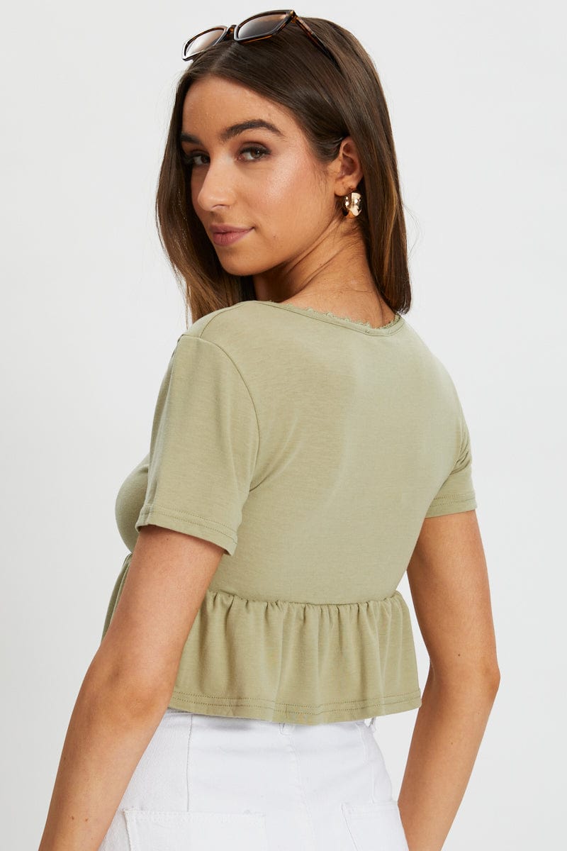 TRIAL JERSEY Green Short Sleeve Peplum T Shirt for Women by Ally